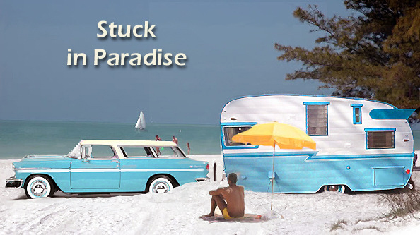 Beautiful Antique car and RV stuck in the sand on beach